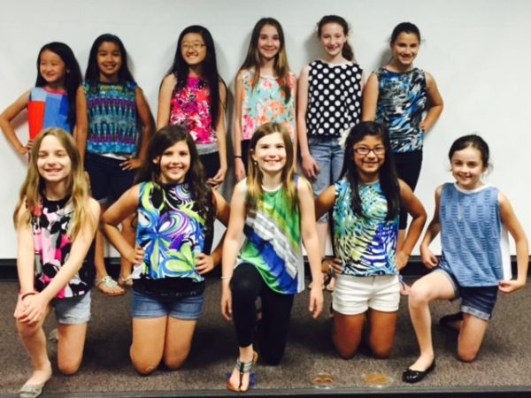 Scouts completing Girl Scout Service Projects with Fashion First Workshops
